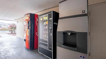 A vending machine and a refrigerator with a beverage dispenser.