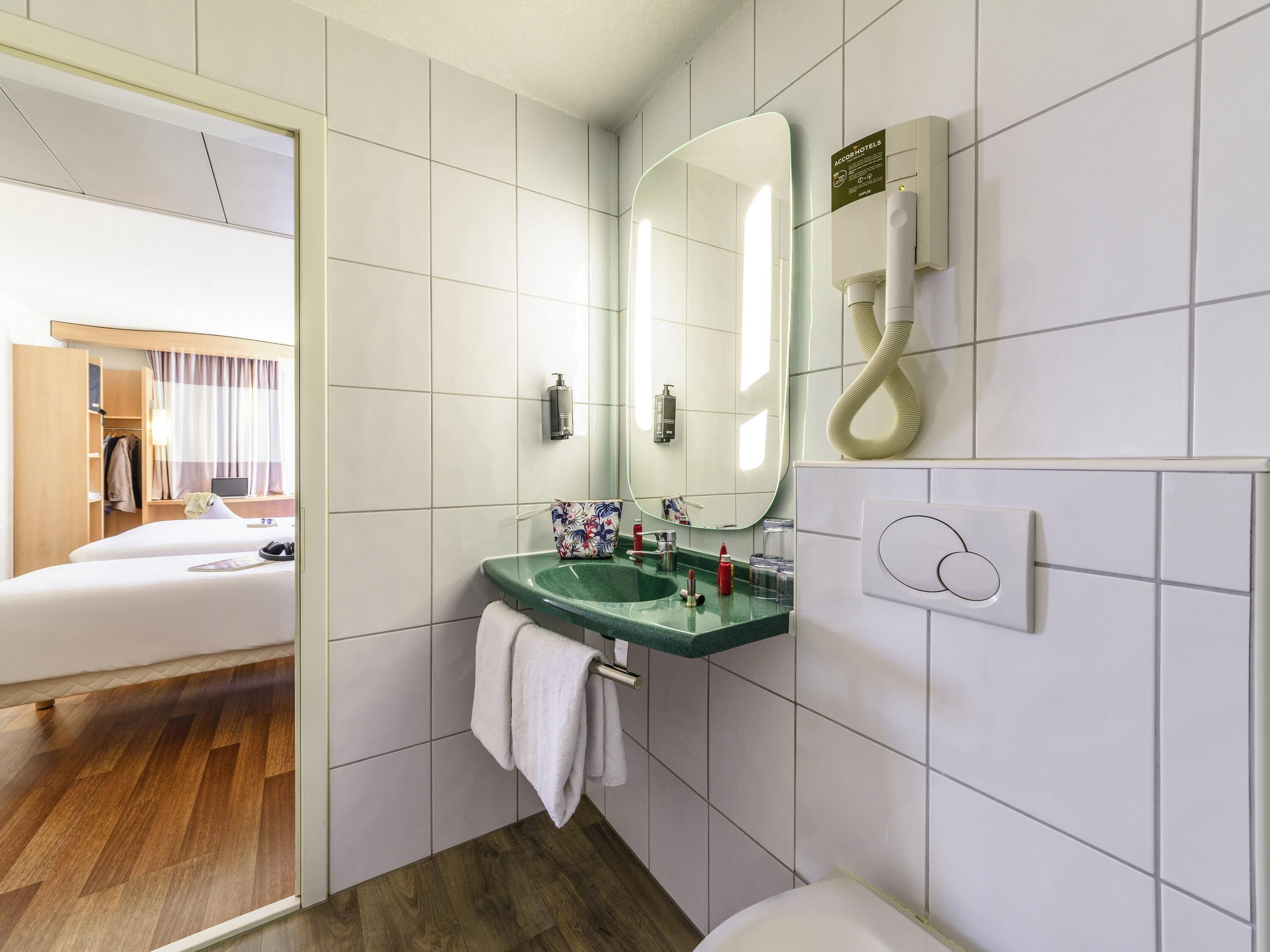 twin room, 2 single beds | in-room safe, desk, soundproofing, iron/ironing board