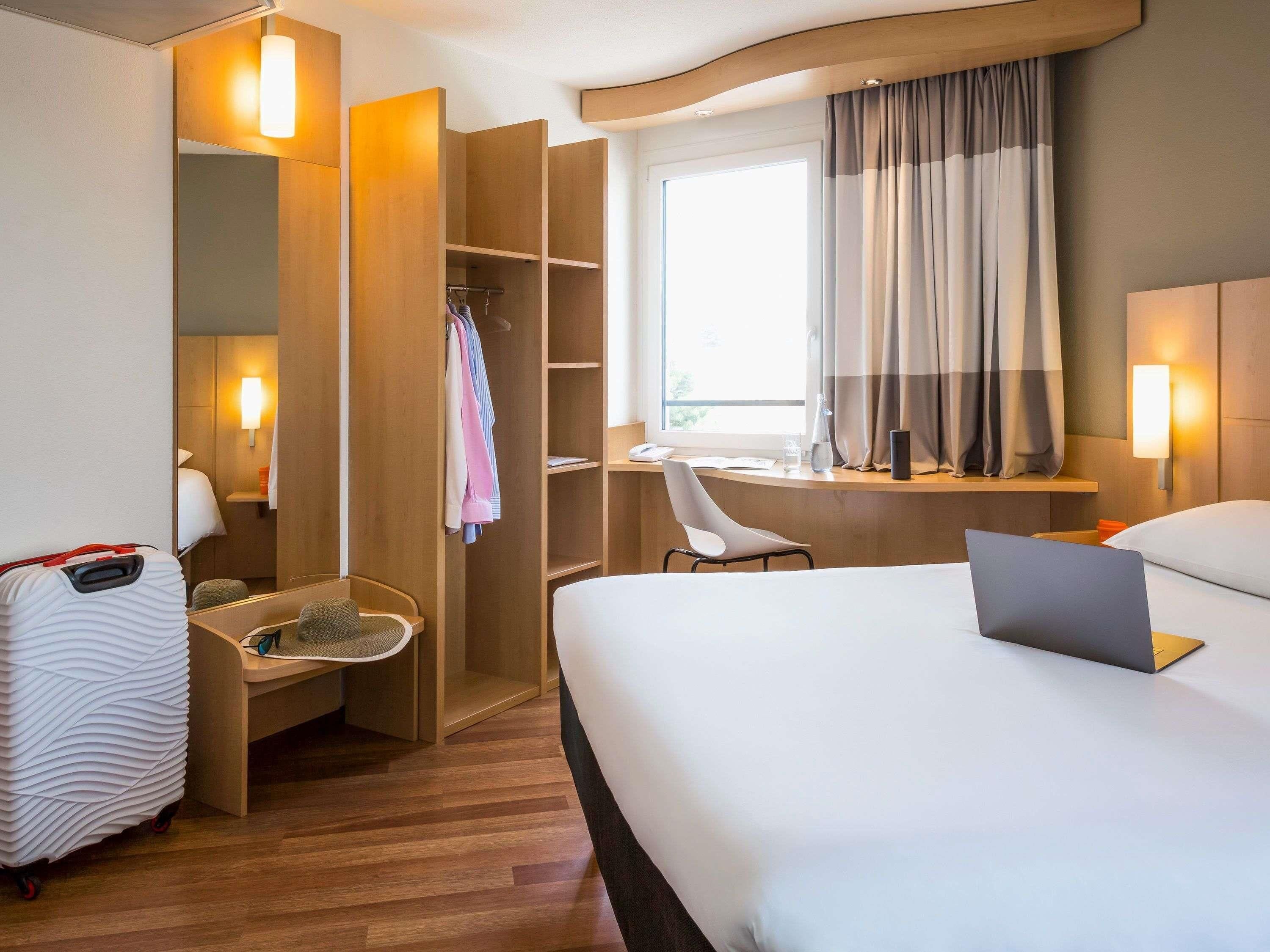 Room, Multiple Beds | In-room safe, desk, soundproofing, iron/ironing board