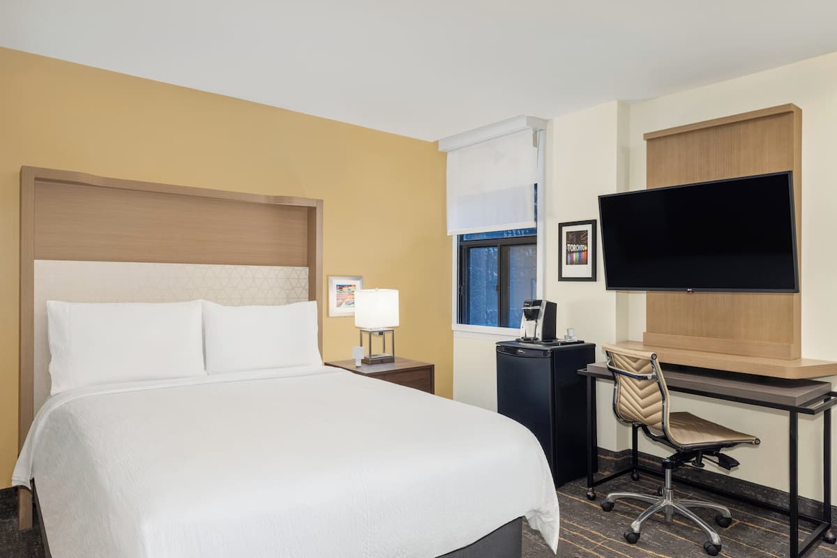 Premium bedding, in-room safe, desk, iron/ironing board