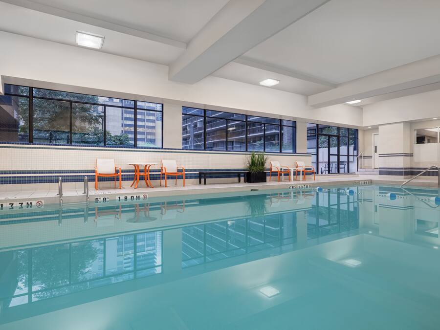 Indoor pool, open 6:00 AM to 11:00 PM, pool loungers