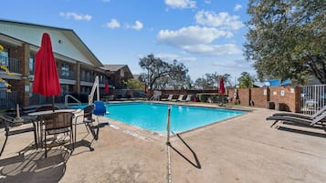 Outdoor pool, open 9:00 AM to 9:00 PM, pool umbrellas, sun loungers