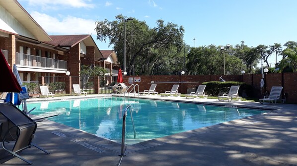 Outdoor pool, open 9:00 AM to 9:00 PM, pool umbrellas, sun loungers
