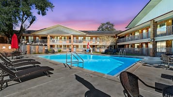 Outdoor pool, open 9:00 AM to 9:00 PM, pool umbrellas, sun loungers