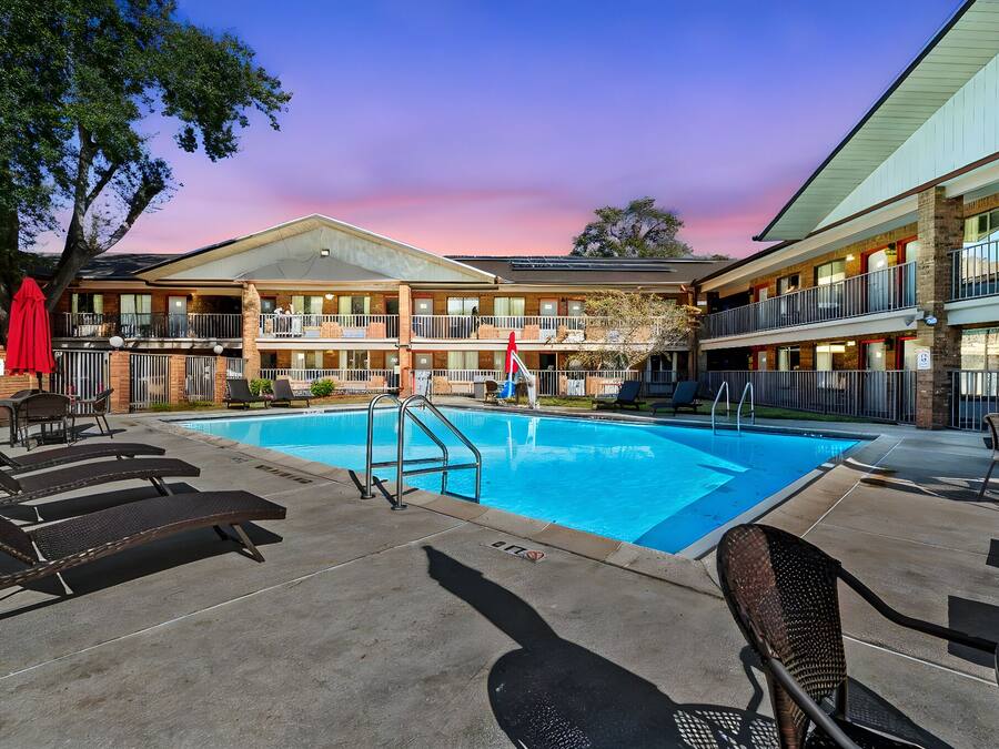 Outdoor pool, open 9:00 AM to 9:00 PM, pool umbrellas, sun loungers