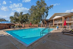 Outdoor pool, open 9:00 AM to 9:00 PM, pool umbrellas, sun loungers