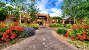 A pathway leading to a building with a sign reading "LORETTO."