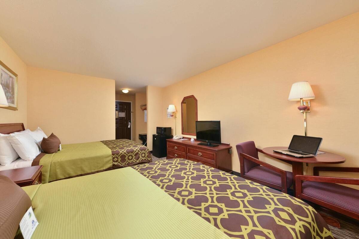 Blackout drapes, iron/ironing board, WiFi (free), bed sheets