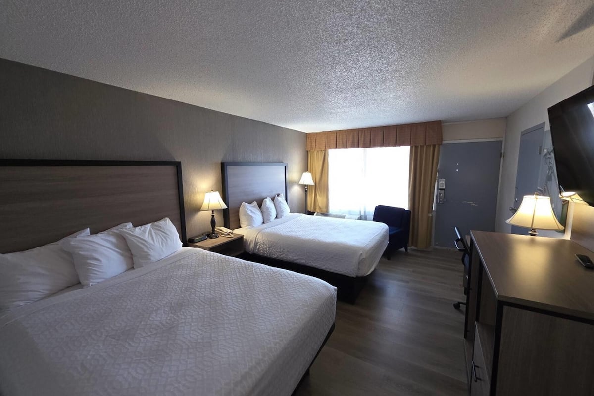 Room, 2 Queen Beds, Non Smoking | Desk, laptop workspace, soundproofing, iron/ironing board