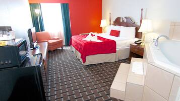 Studio Suite, 1 King Bed, Non Smoking | Individually decorated, individually furnished, desk, blackout drapes