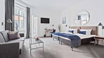 Family Room, 1 King Bed, Non Smoking (with Sofabed) | In-room safe, laptop workspace, blackout curtains, iron/ironing board