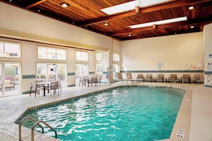 Indoor pool, open 10:00 AM to 10:00 PM, pool umbrellas, sun loungers