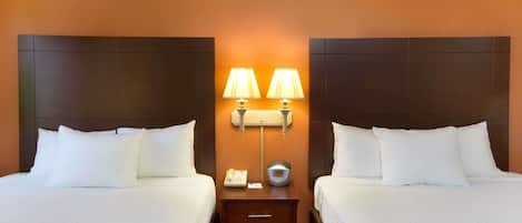 Premium bedding, desk, blackout drapes, soundproofing