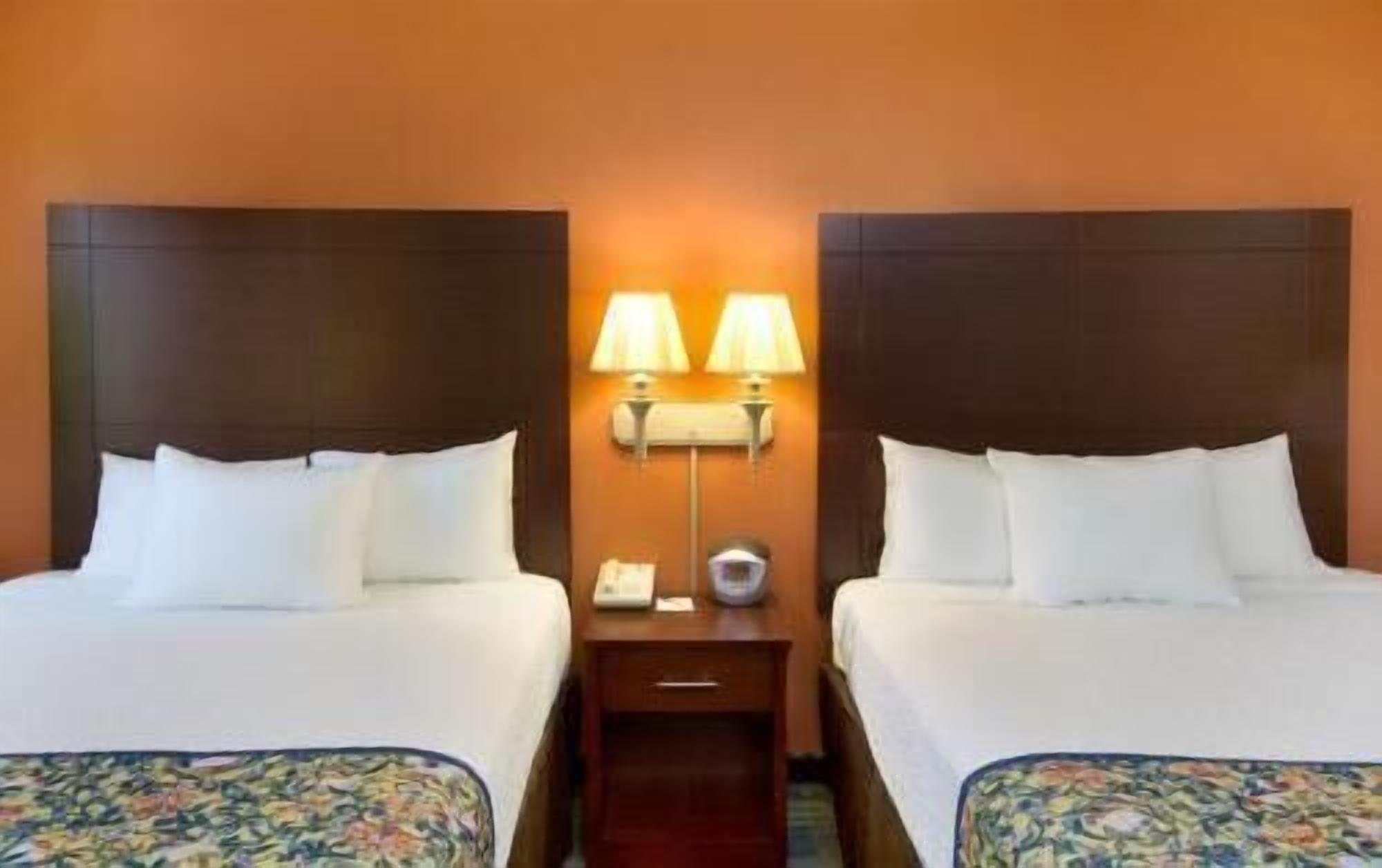 Premium bedding, desk, blackout drapes, soundproofing