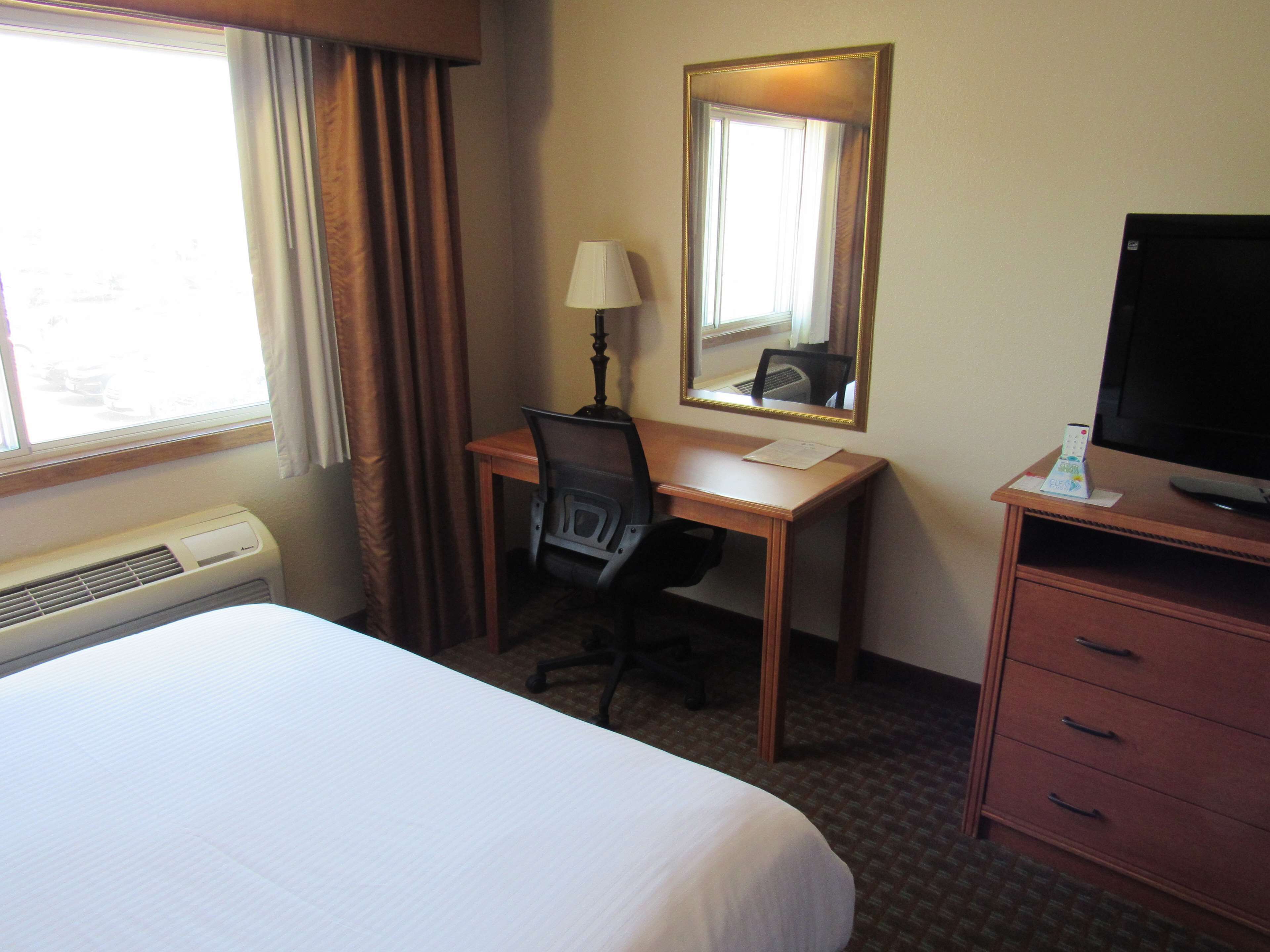 room, 1 king bed | blackout curtains, iron/ironing board, cots/infant beds, rollaway beds