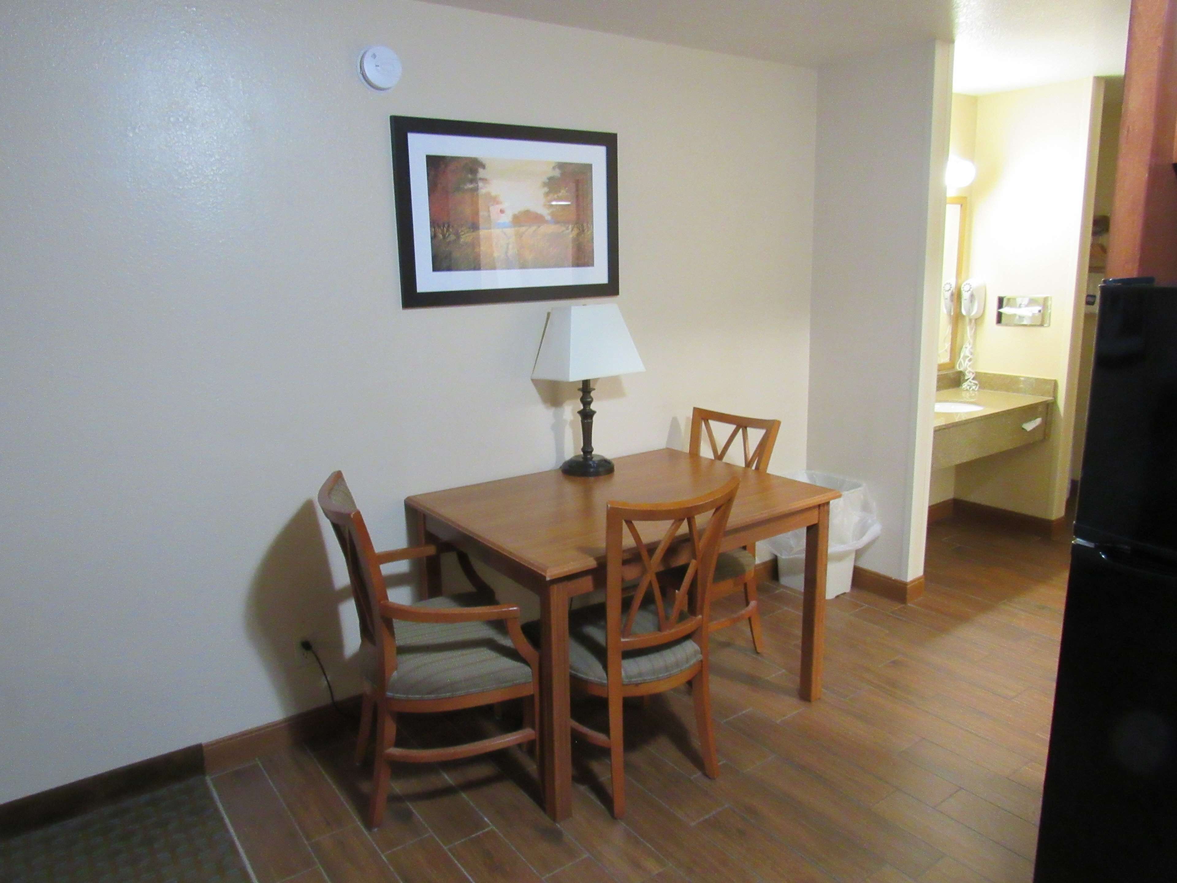 room, 1 king bed (dining table) | blackout curtains, iron/ironing board, cots/infant beds, rollaway beds