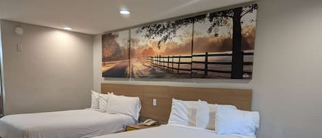 Wifi gratis, ropa de cama y despertador