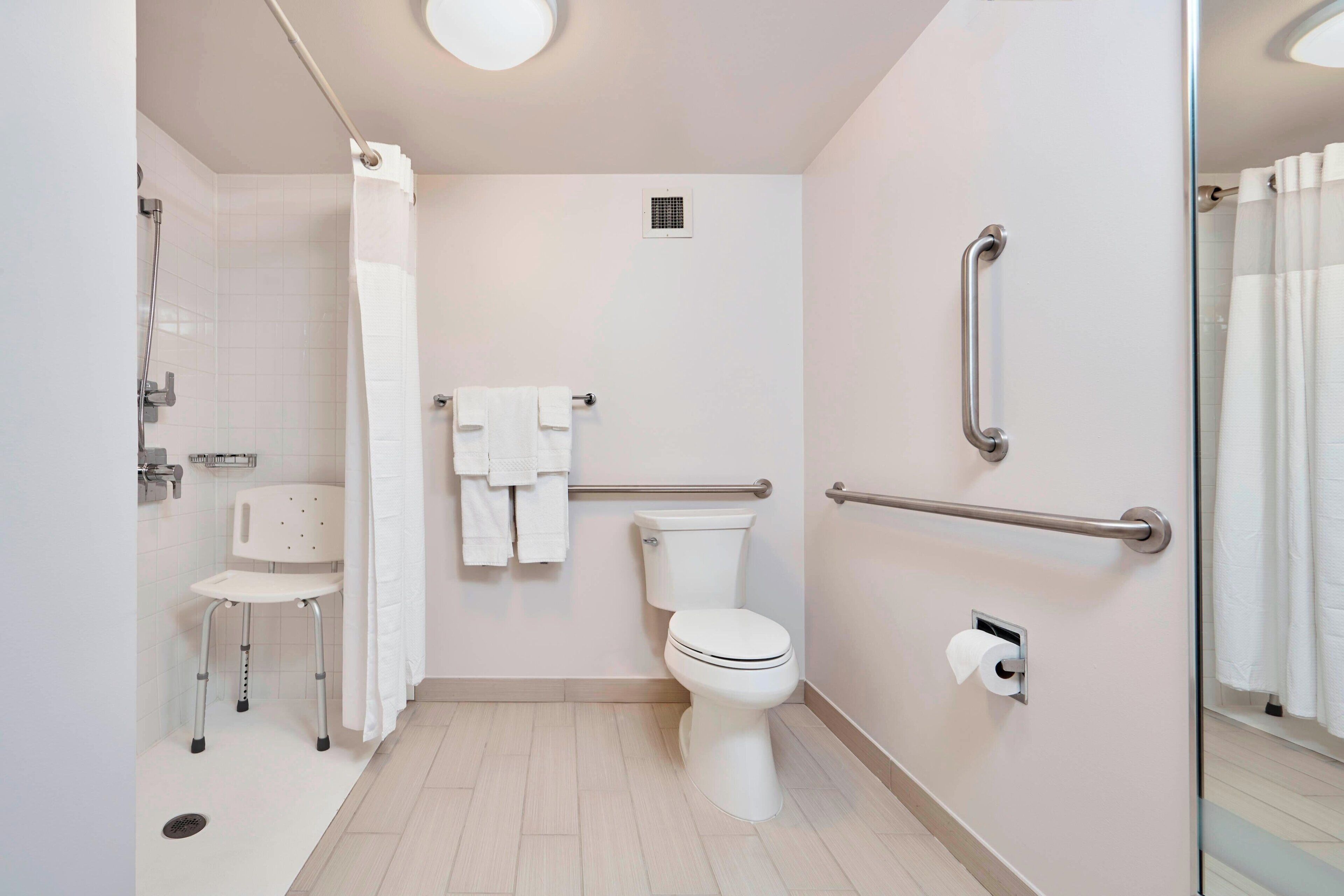 combined shower/bathtub, free toiletries, hair dryer, towels