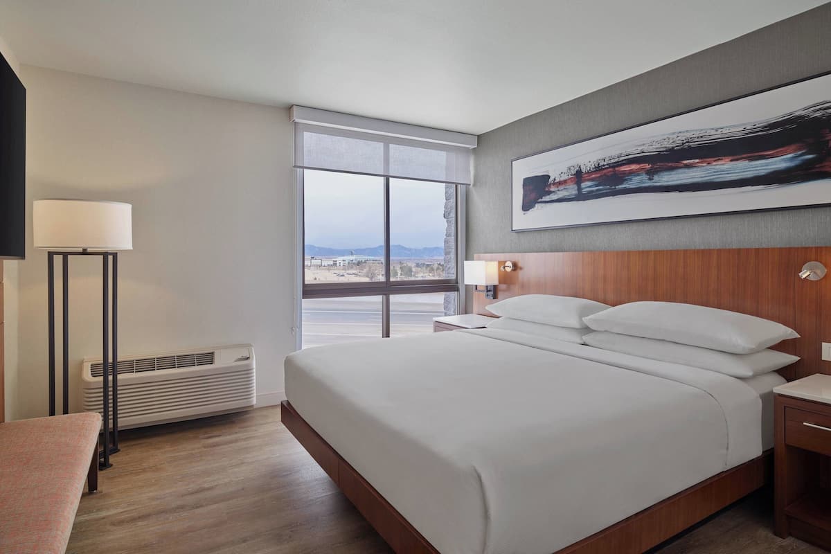 premium bedding, desk, laptop workspace, blackout curtains