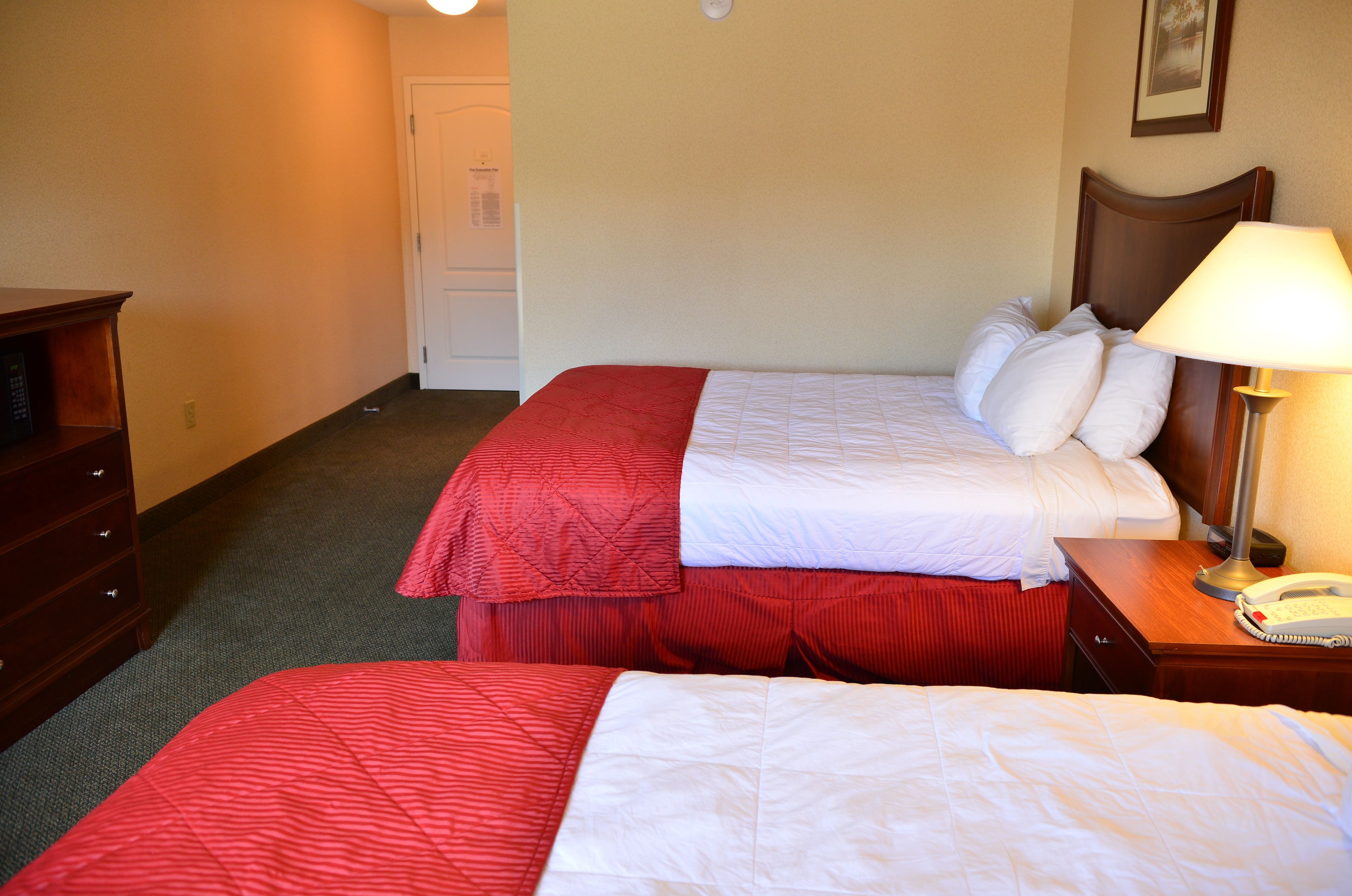 Desk, blackout drapes, iron/ironing board, free cribs/infant beds