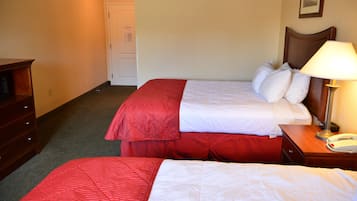 Desk, blackout drapes, iron/ironing board, free cribs/infant beds