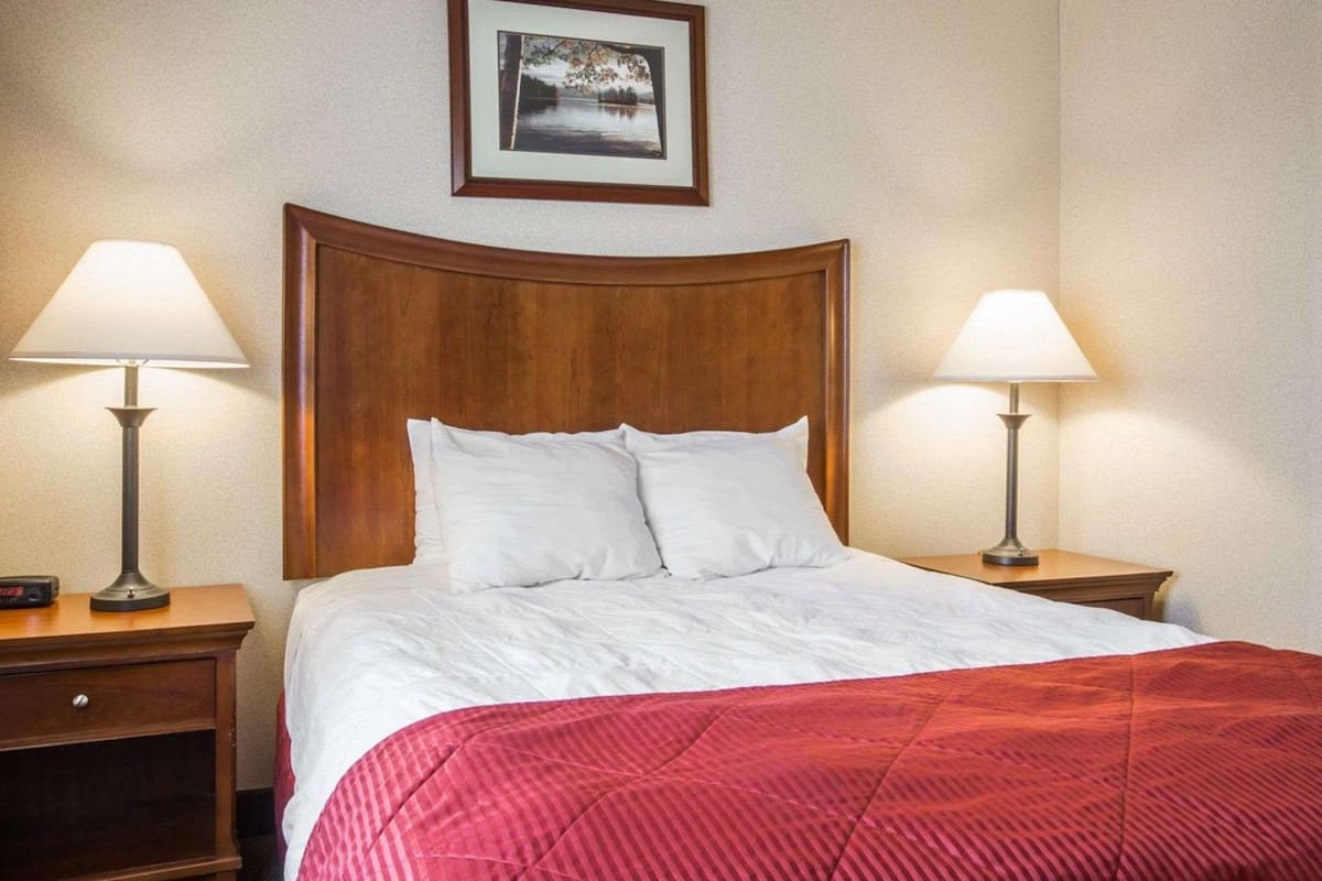 desk, blackout curtains, iron/ironing board, free cots/infant beds