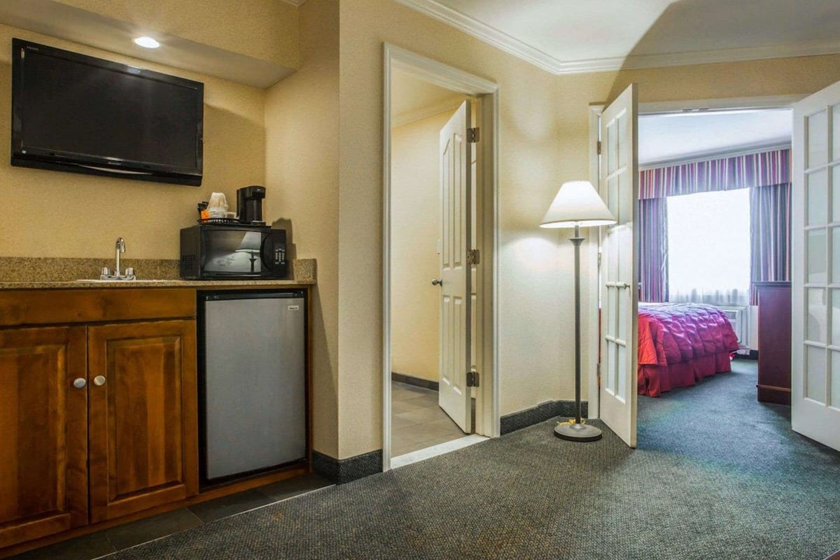 desk, blackout curtains, iron/ironing board, free cots/infant beds