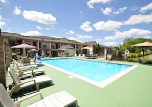 Seasonal outdoor pool, open 9 AM to 9 PM, sun loungers