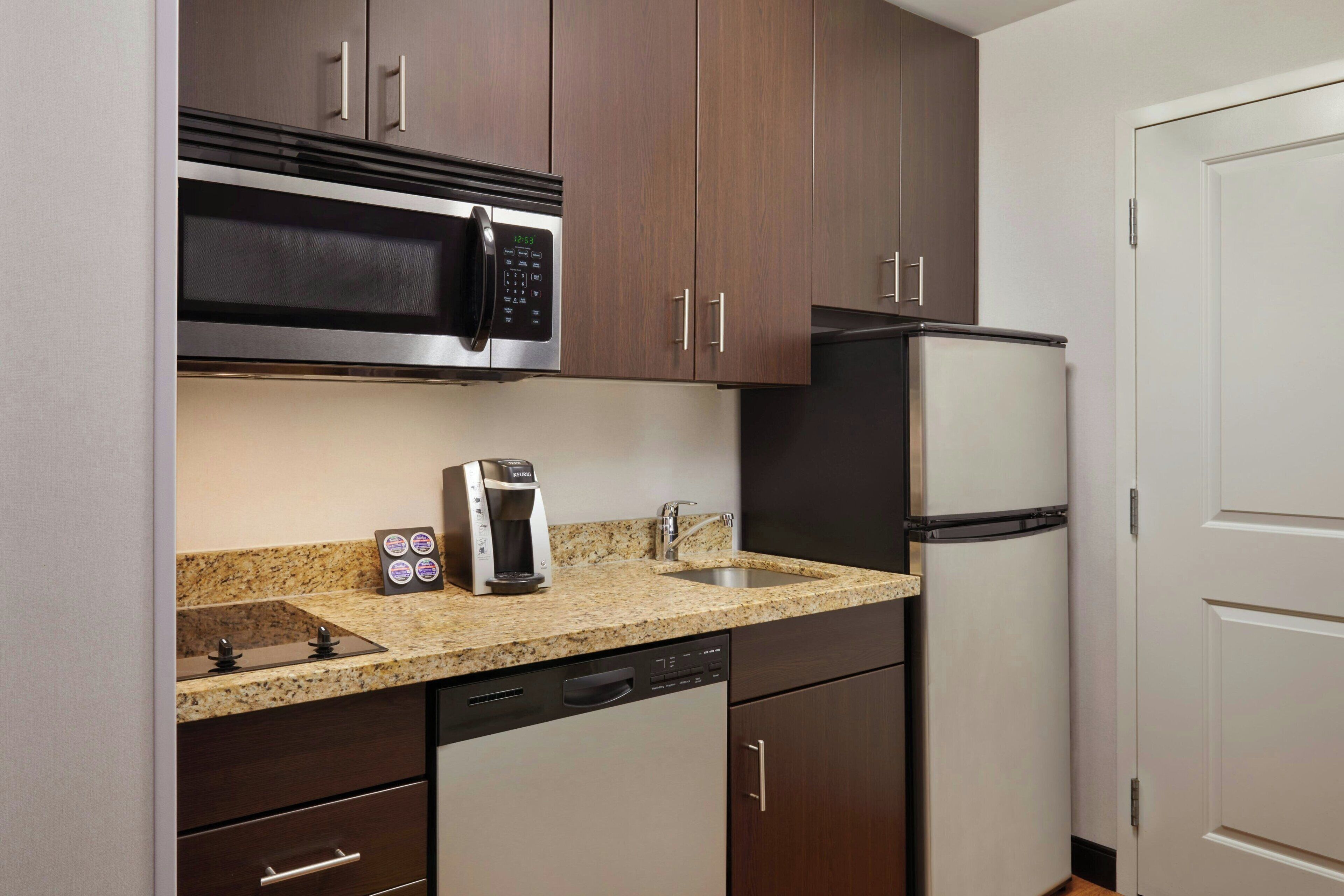 studio, 1 king bed with sofa bed | private kitchen | full-sized fridge, microwave, stovetop, dishwasher