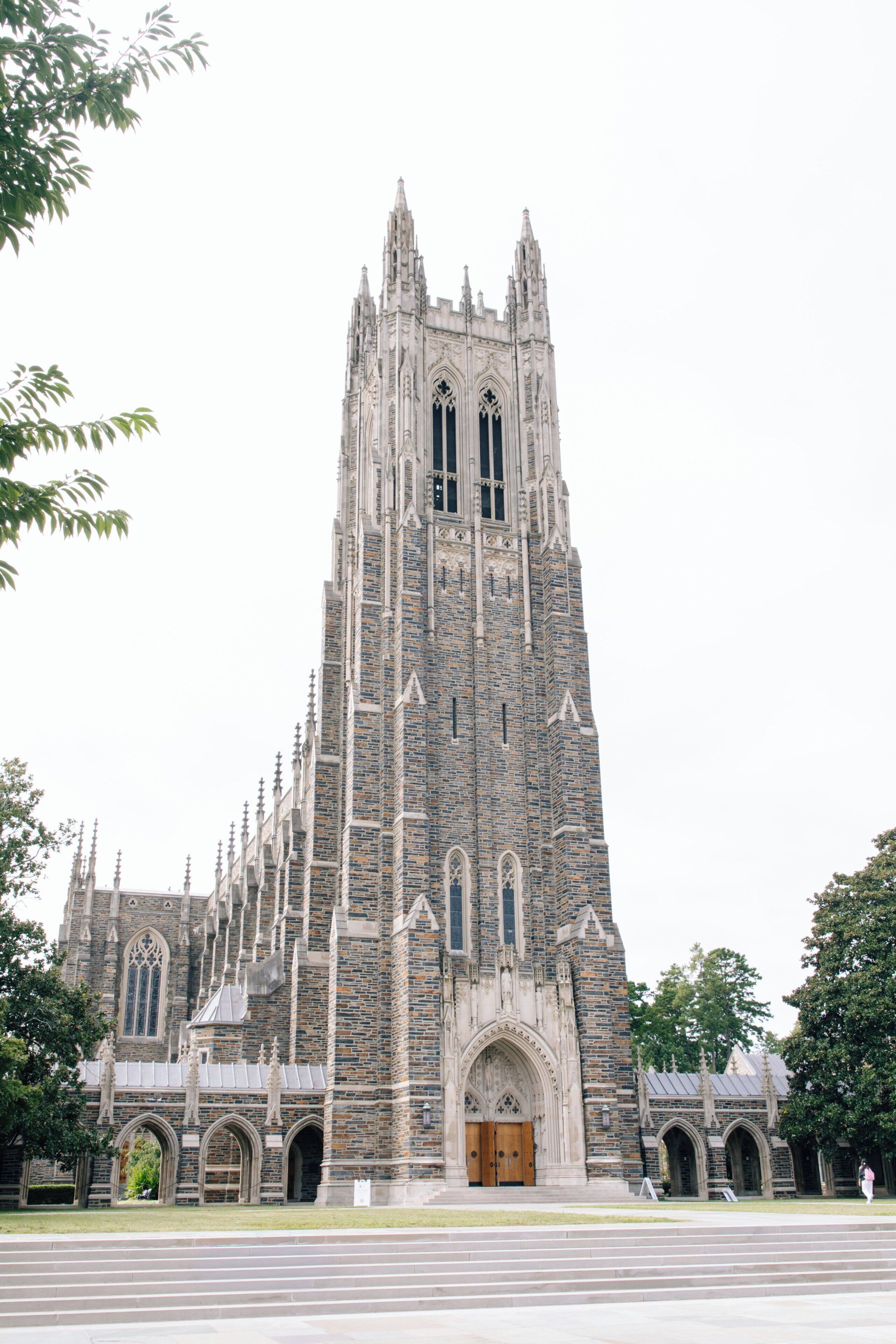 A large, Gothic-style church with a tall tower and arched windows.