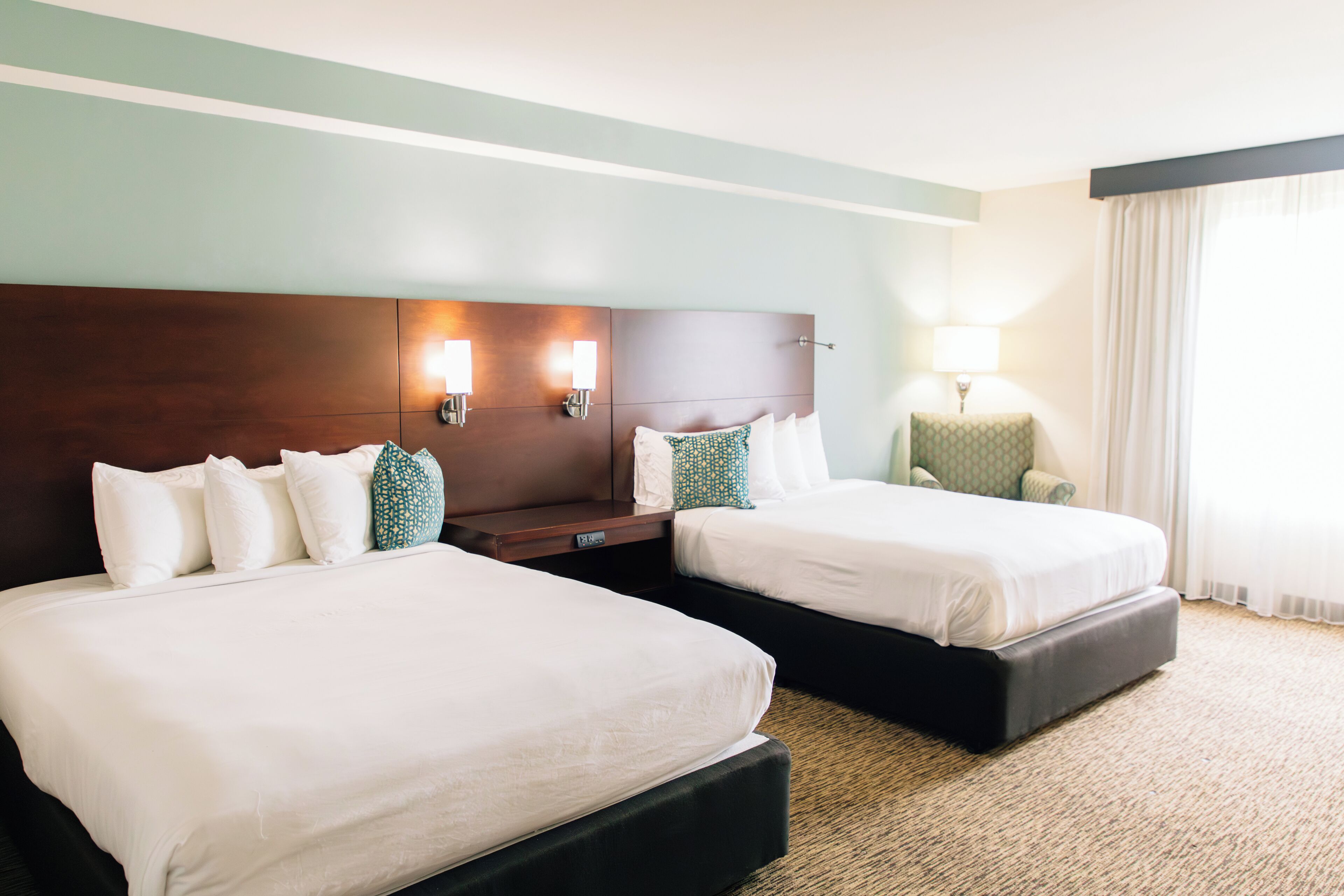 Deluxe Room, 2 Queen Beds (Standard | View) | In-room safe, desk, laptop workspace, blackout drapes