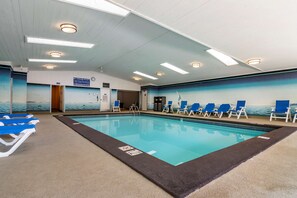 Indoor pool, open 9:00 AM to 9:00 PM, pool loungers