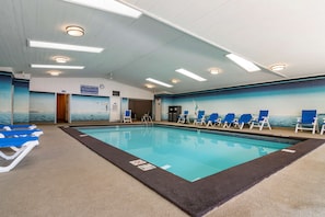 Indoor pool, open 9:00 AM to 9:00 PM, pool loungers