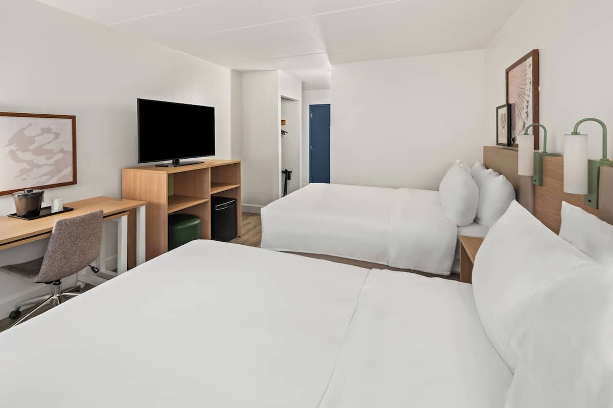 Luxe beddengoed, pillowtop-bedden, een kluis op de kamer, een bureau