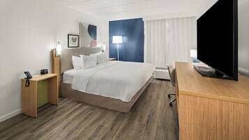 Luxe beddengoed, pillowtop-bedden, een kluis op de kamer, een bureau