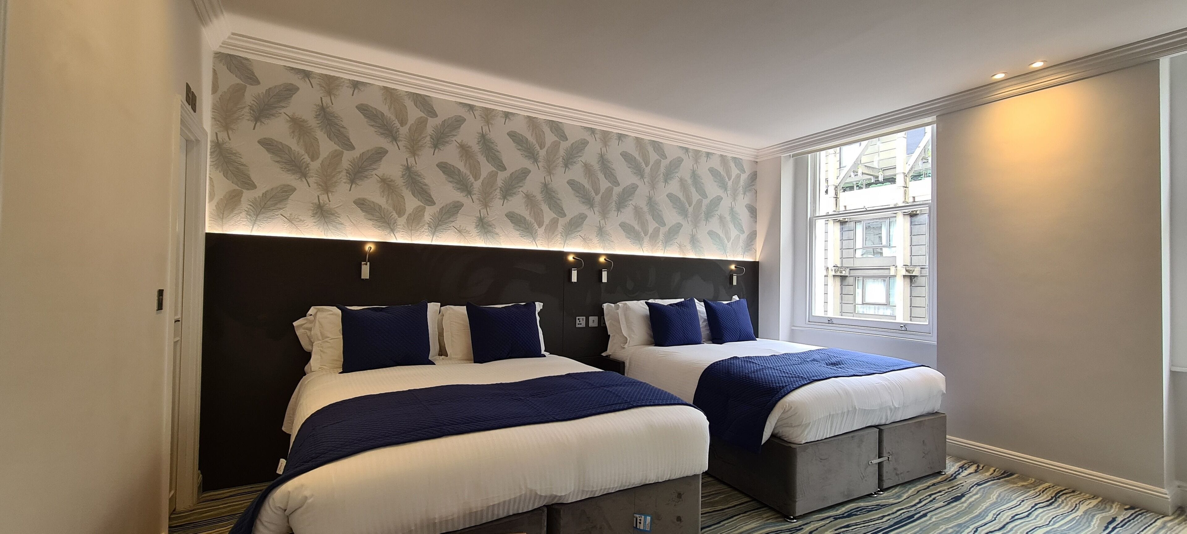 deluxe quadruple room | 1 bedroom, hypo-allergenic bedding, in-room safe, desk