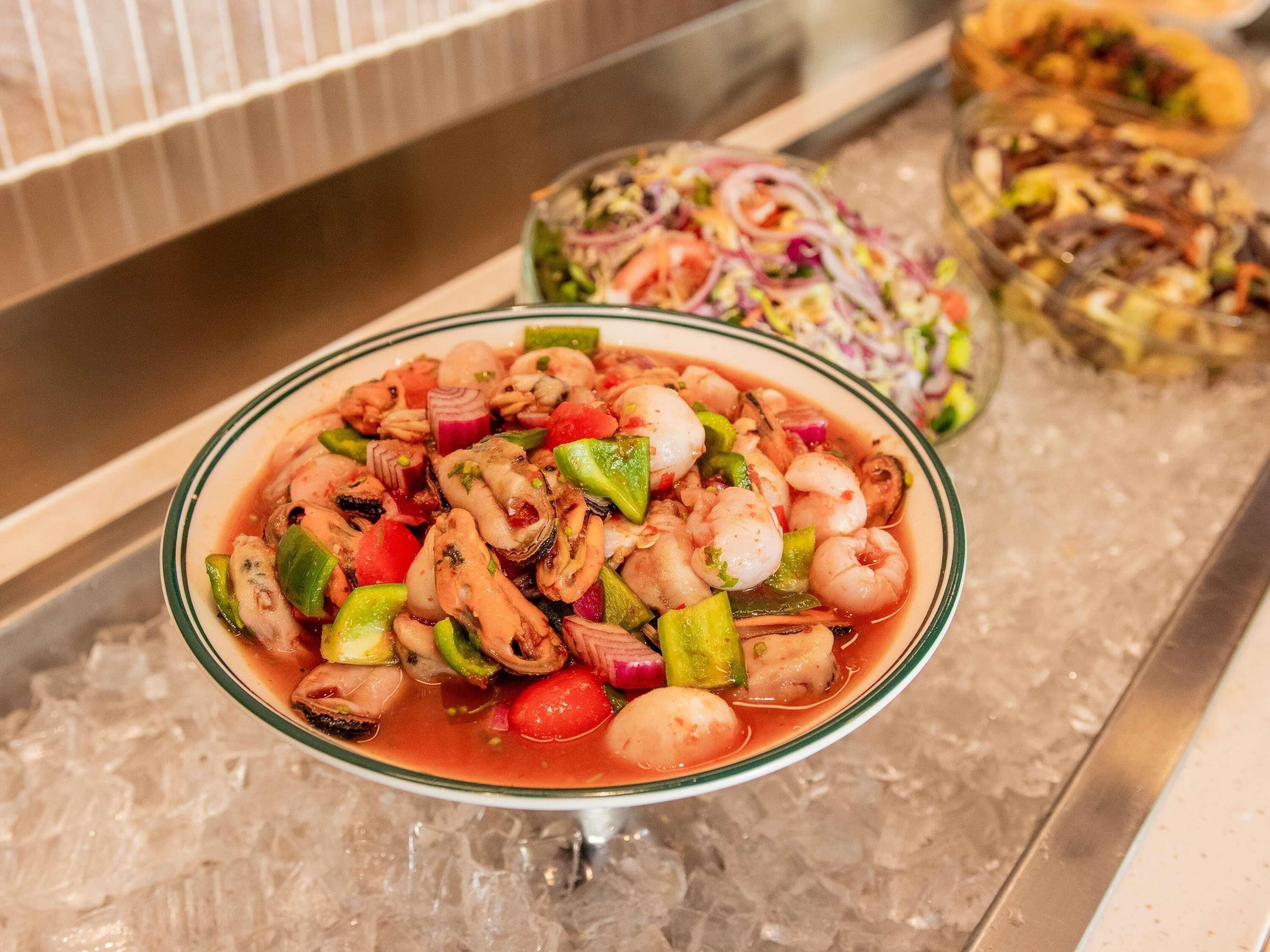 A seafood dish on a bed of ice.