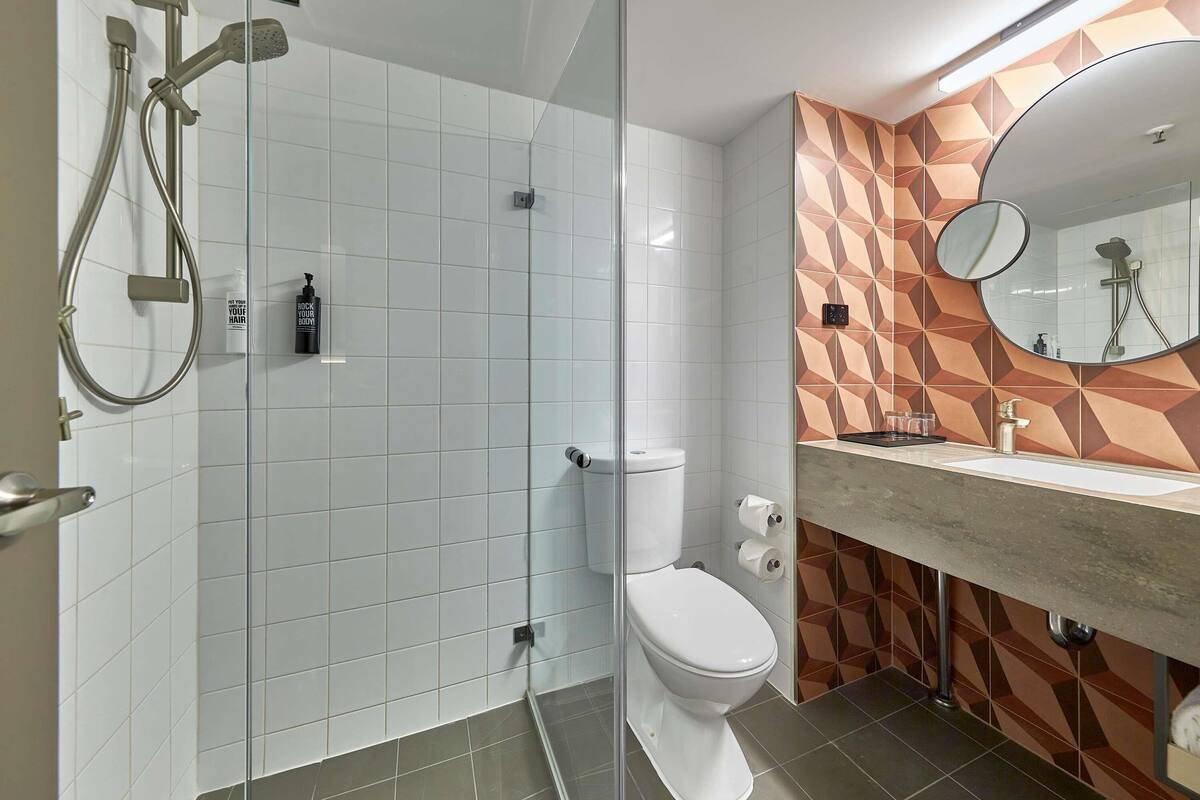 Shower, eco-friendly toiletries, hair dryer, towels