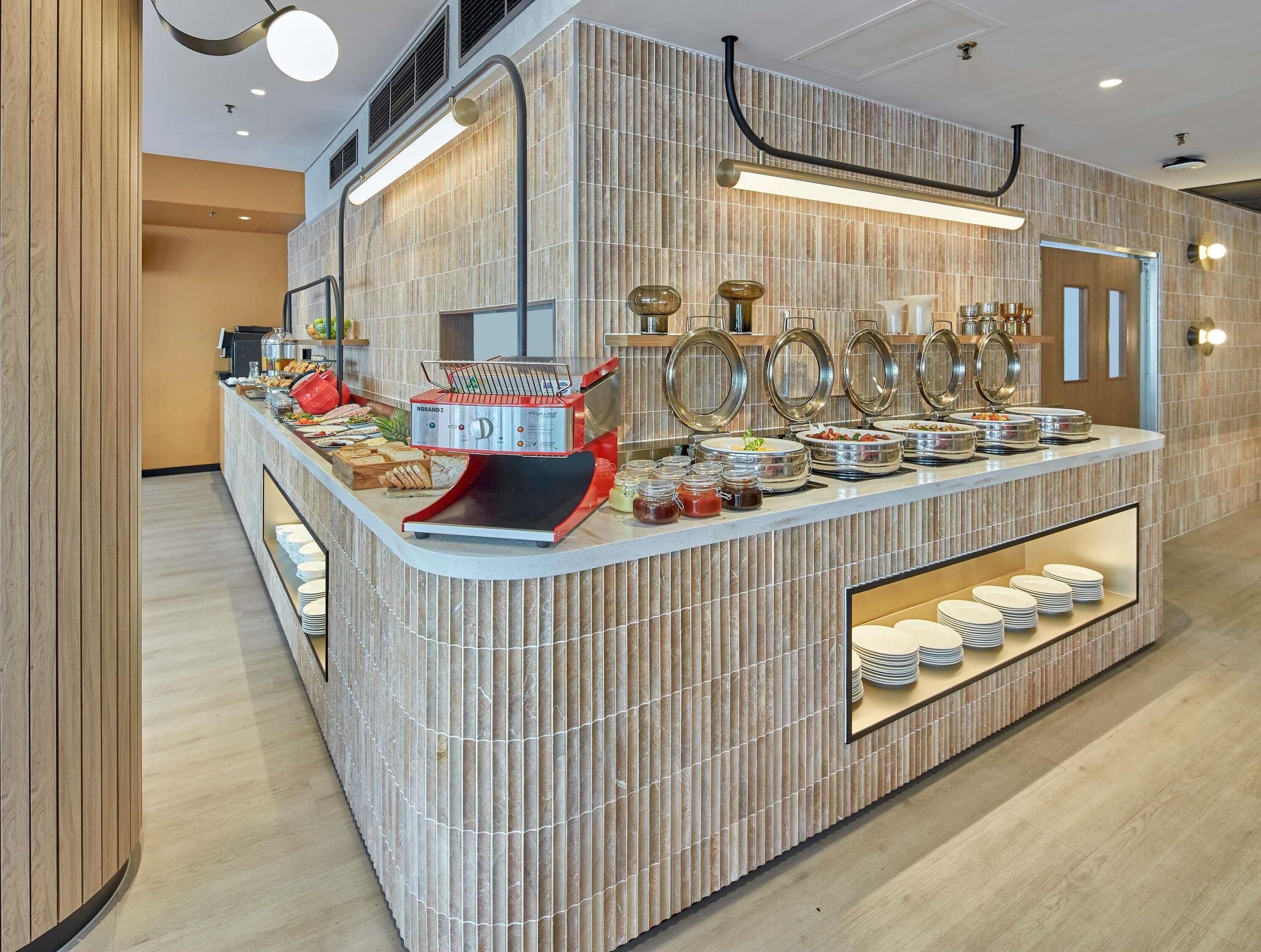 Daily buffet breakfast (AUD 30 per person)