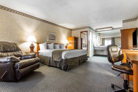 Standard Room, 1 King Bed, Non Smoking | In-room safe, desk, laptop workspace, blackout drapes. Quality Inn & Suites Silicon Valley