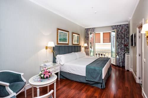 Chambre Deluxe Double ou avec lits jumeaux | Literie de qualité supérieure, minibar, coffres-forts dans les chambres