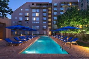 Outdoor pool, open 6 AM to 10 PM, pool umbrellas, sun loungers