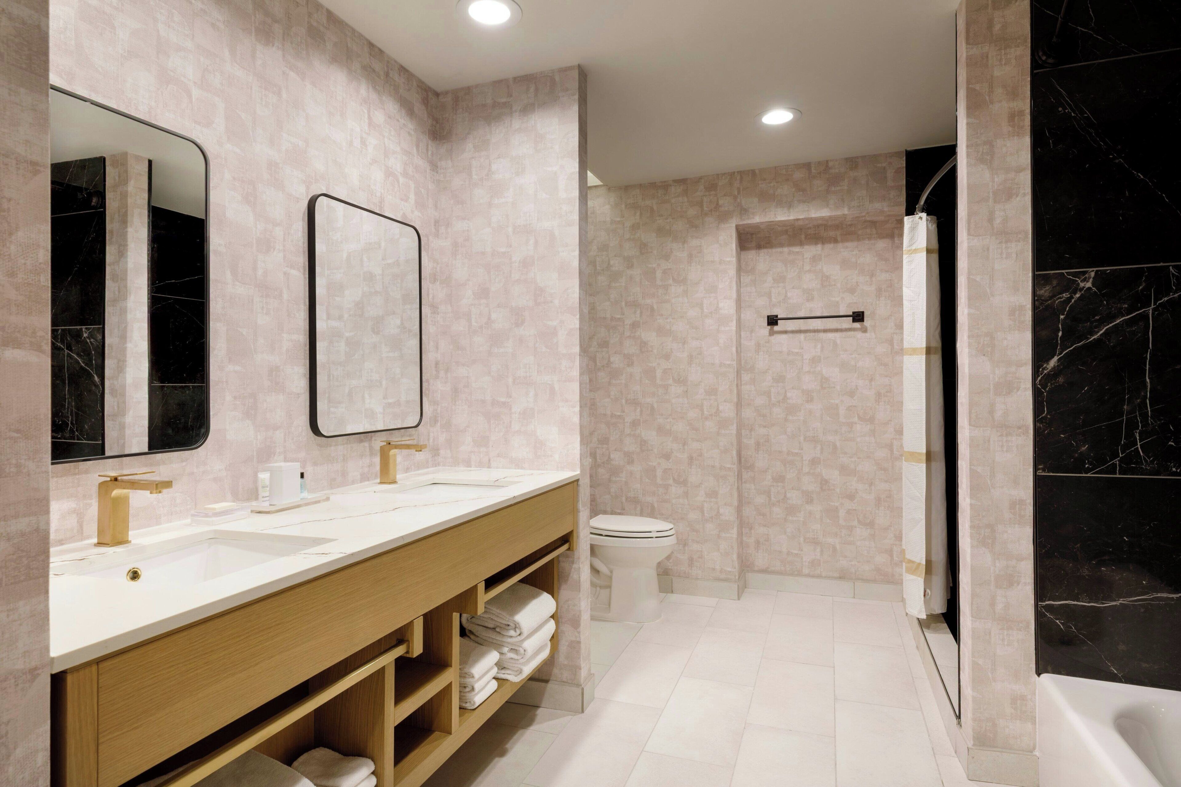 Combined shower/tub, deep soaking tub, free toiletries, hair dryer