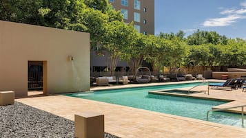 Outdoor pool, open 6 AM to 10 PM, pool umbrellas, sun loungers