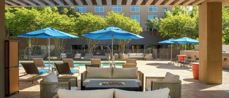 Outdoor pool, open 6 AM to 10 PM, pool umbrellas, sun loungers