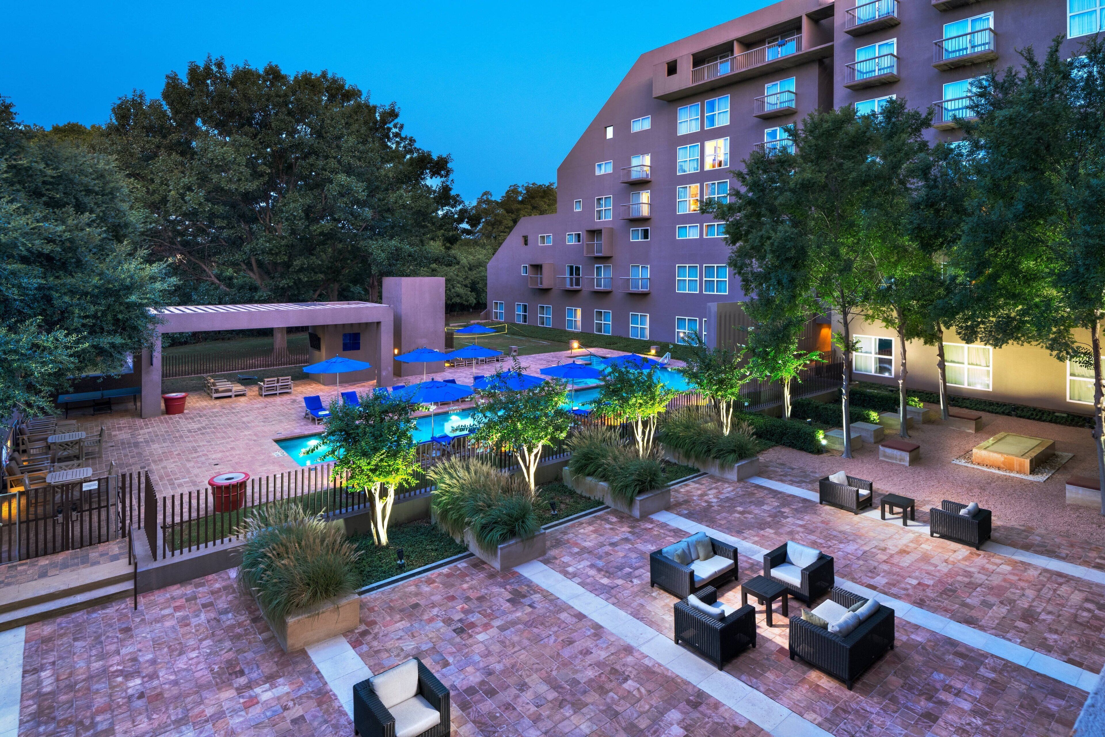 outdoor pool, open 6 am to 10 pm, pool umbrellas, pool loungers