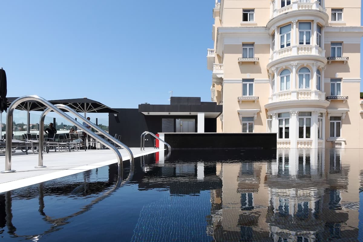 seasonal outdoor pool, pool umbrellas, pool loungers