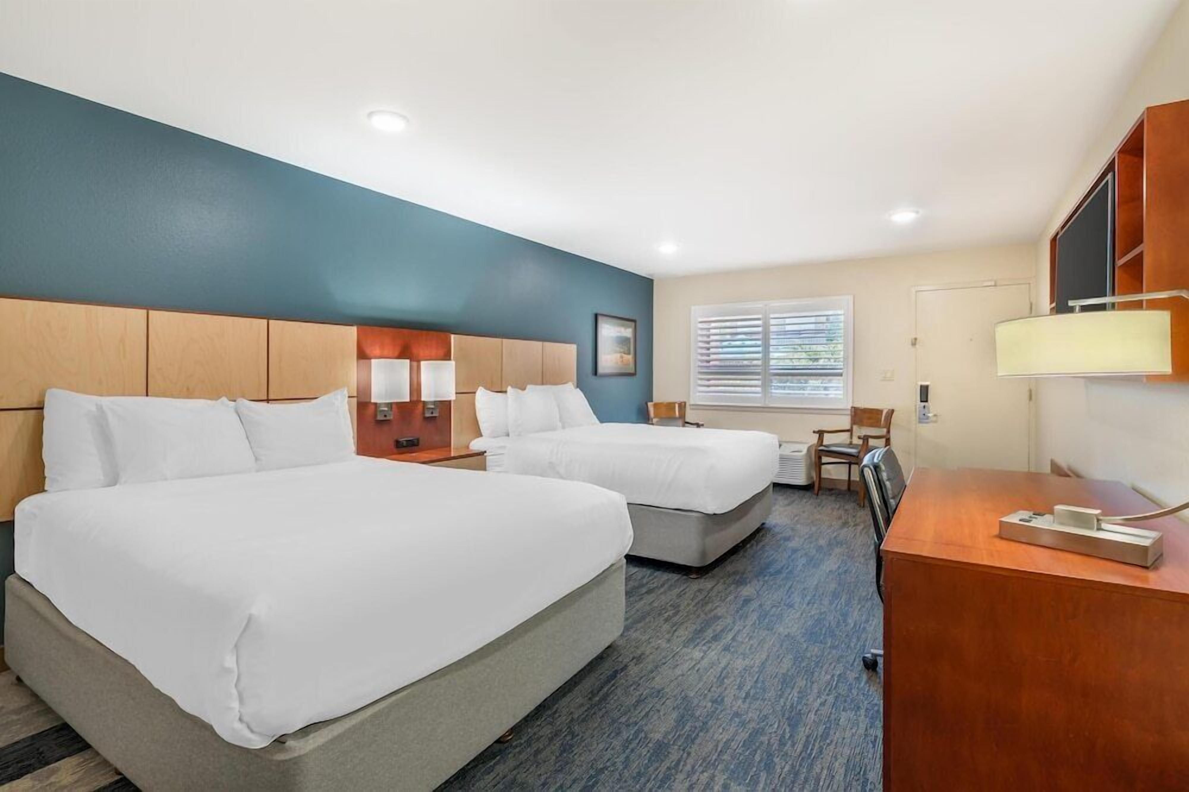 Desk, laptop workspace, iron/ironing board, rollaway beds