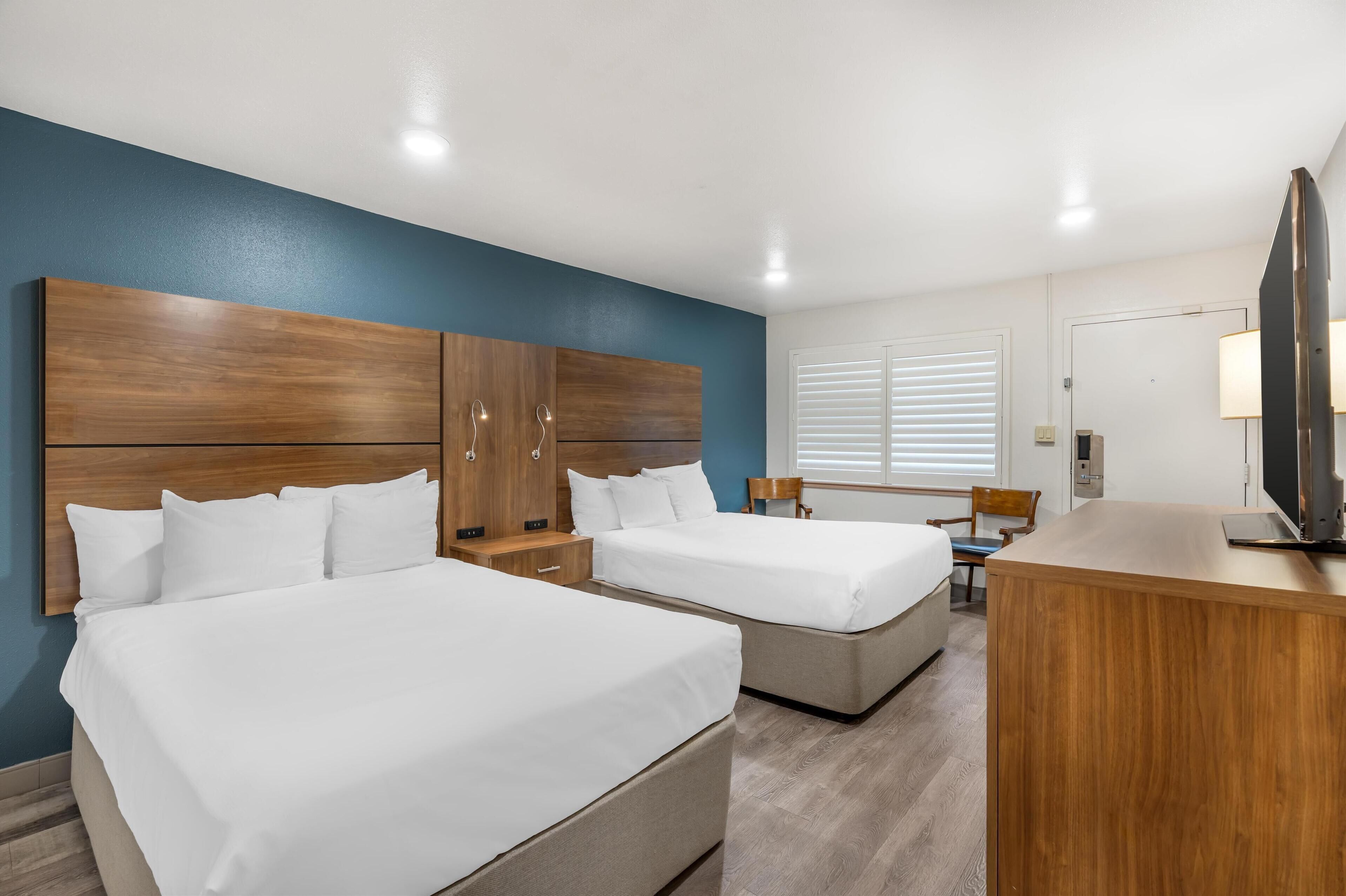 Standard Room, 2 Double Beds, Non Smoking, Refrigerator | Desk, laptop workspace, iron/ironing board, rollaway beds