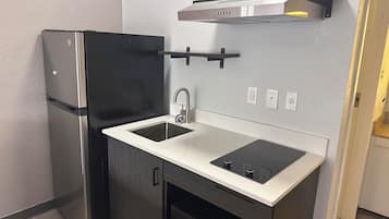 Fridge, microwave, dining tables